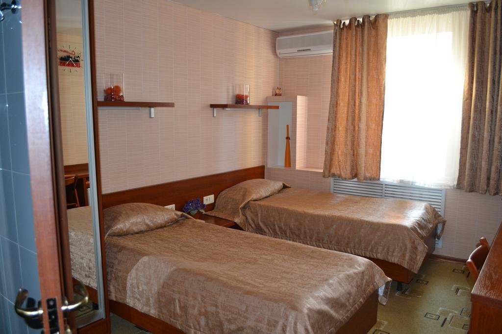 City Hotel Gomel Habitación foto